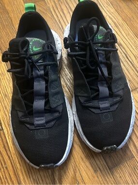 Nike Women's Black Running Sneakers with Green Accents